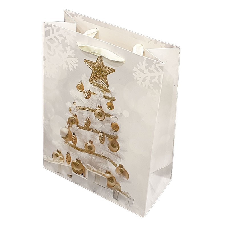 Emballage cadeau de Noël doré avec des décorationsà paillettes